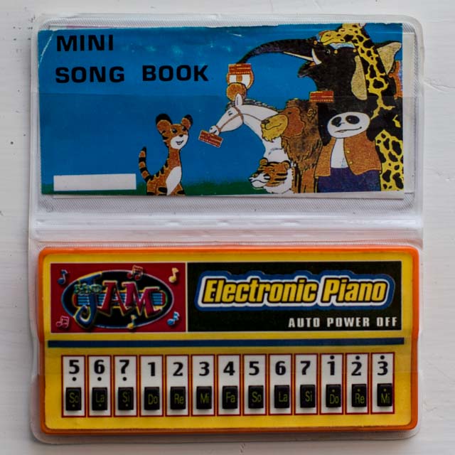 mini pocket piano toy